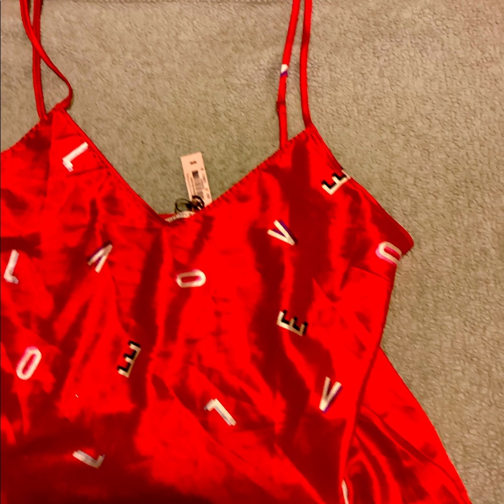 Pajama slip by Victoria Secret in the color red. The size is Medium